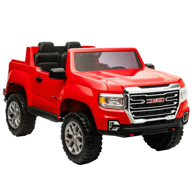 montable electrico lee monde gmc canyon at4 rojo Pickup infantil eléctrico rojo con doble asiento y cabeceras, parrilla frontal cromada con logo GMC, faros LED, espejos y volante negros, ruedas grandes con llantas plateadas y suspensión visible; batería 12V, pedal en el acelerador y control remoto; requiere ensamblaje. También suele usarse para prácticas de conducción supervisada por padres.