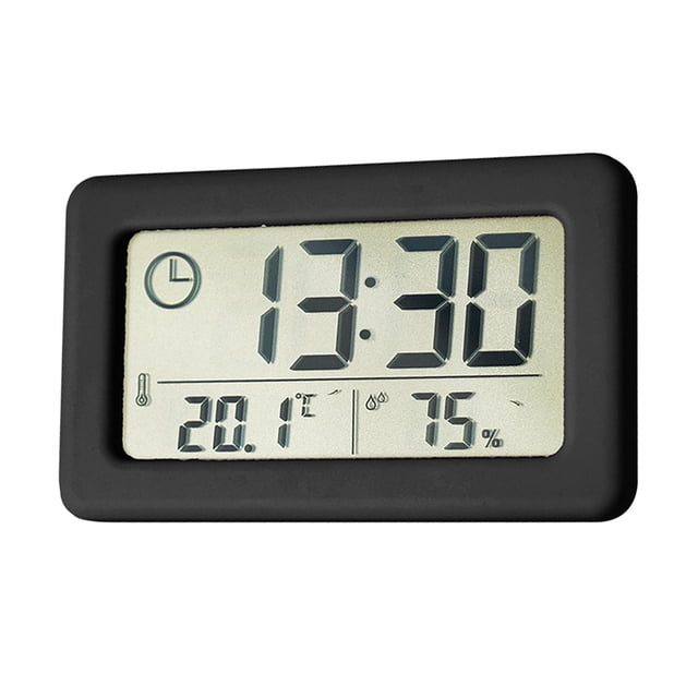reloj de pared digital temperatura lcd sunnimix reloj de pared digital negro con pantalla LCD rectangular, vista frontal centrada que muestra hora 13:30 en dígitos grandes 12/24H, panel inferior con lectura de temperatura 20.1°C y higrómetro 75%, carcasa ABS, medidas 9.6 x 5.8 x 1 cm, apto para colgar en pared o apoyar; a menudo usado en oficinas o cocinas.