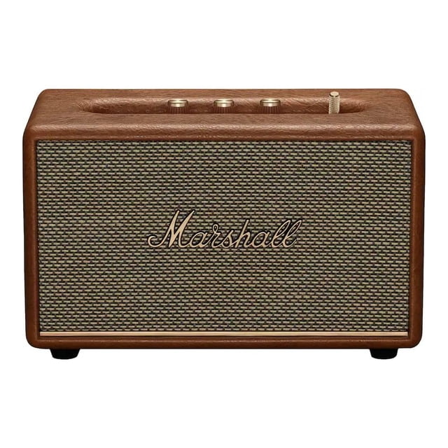 bocina inalámbrica marshall acton iii color cafe, vista frontal centrada; carcasa rectangular café texturizada con rejilla tejida beige y logo Marshall dorado, controles físicos dorados y perilla superior derecha, patas negras pequeñas. Ideal para salas u oficinas, con Bluetooth para reproducción sin cables y sonido potente y balanceado; a menudo se usa también como altavoz de escritorio para reuniones.