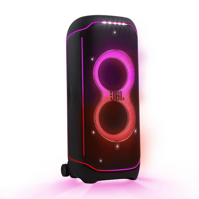 jbl partybox ultimate 1100w wireless party speaker Altavoz PartyBox Ultimate negro, vista frontal 3/4 con rejilla que revela dos woofers circulares y anillos LED multicolor; panel lateral texturizado, ruedas inferiores y gran espectáculo de luces estrelladas y estroboscópicas sincronizadas con la música, pensado para ofrecer sonido potente vía Bluetooth y Wi‑Fi y con entradas para micrófonos y guitarra, también apto para sesiones de canto o presentaciones en eventos.