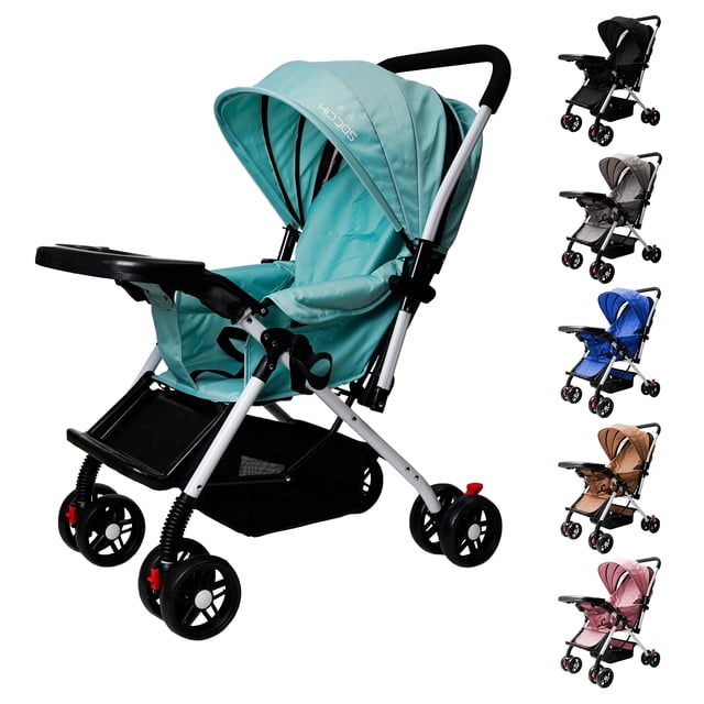 carriola reversible para bebe 2 en 1 plegable KIDDOS verde, vista 3/4 frontal con chasis blanco; asiento acolchonado y capota amplia con logo, bandeja frontal, reposapiés regulable, mosquitero incluido, ruedas delanteras dobles con suspensión y cesta inferior; se convierte rápidamente en bambineto reclinado para descanso y también resulta adecuada para paseos cortos fuera de casa.