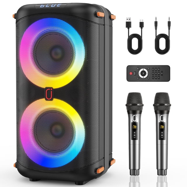 bocina jyx altavoz bluetooth portátil con 2 micrófonos y luces dj para fiestas t27-t negro, vista frontal 3/4 con doble woofer y anillos LED RGB visibles, rejilla metálica, asa integrada y esquinas protectoras; incluye 2 micrófonos inalámbricos, control remoto, cable USB y AUX, pantalla superior con indicador BLUE, ideal para karaoke, fiestas y uso exterior.