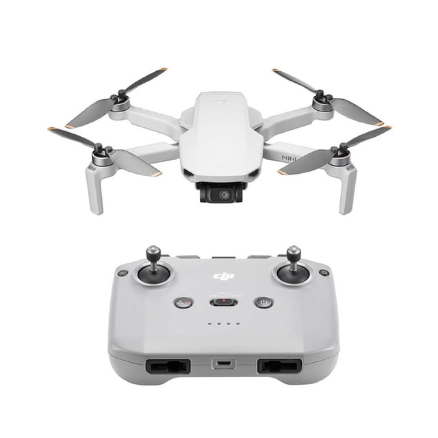 dron dji mini 4k (gl) gris, vista frontal centrada del dron con cámara CMOS 12 MP en gimbal de 3 ejes y control remoto gris debajo; cuerpo ultraligero con hélices desplegadas y patas de aterrizaje sobre fondo blanco, pensado para fotografía aérea 4K y modos inteligentes QuickShots y Panorama, y a menudo usado para rodajes de viaje por su portabilidad.