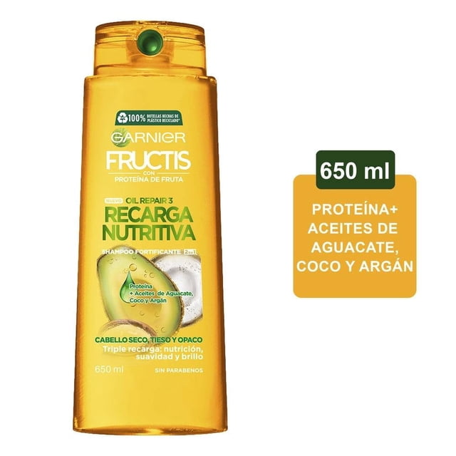 shampoo garnier fructis oil repair 3 recarga nutritiva 650 ml botella frontal amarilla de 650 ml con tapa de boquilla, etiqueta 'Recarga nutritiva' y gráfico de gotas con aguacate; indica proteína y aceites de aguacate, coco y argán para cabello seco, tieso y opaco; suele usarse como complemento en rutinas de cuidado capilar.