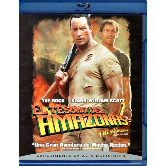 el tesoro del amazonas dwayne johnson pelicula blu-ray sony blu-ray Vista frontal de la carátula Blu-ray de El Tesoro del Amazonas con Dwayne Johnson en primer plano sosteniendo una escopeta y camiseta rasgada, actor secundario detrás, fondo con llamas y el título grande en amarillo; indica formato Blu-ray y género Aventuras.