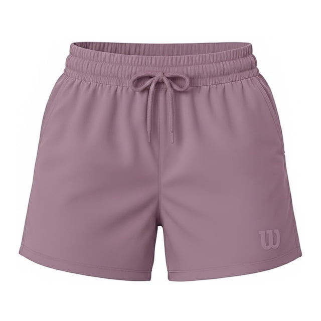 short deportivo wilson para mujer flexy pretina licra color lila talla ch Short deportivo Wilson para mujer en lila, vista frontal centrada; corte corto tipo biker con pretina elástica ancha y cordón ajustable, tela lisa que indica ligereza y transpirabilidad, costuras visibles en panel frontal y dobladillo, logo W tono sobre tono en pierna izquierda, fondo blanco. Adecuado para gym, yoga y running y también ideal para un look sport casual.