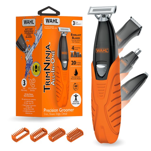 rasuradora eléctrica y recortadora de barba wahl trim ninja 3030115 híbrida todo en uno; vista frontal centrada del cuerpo principal naranja y negro con logotipo Wahl, empuñadura texturada y botón plateado; cuatro cabezales intercambiables a la derecha (recortadora de precisión, nasal, afeitadora bidireccional y recortadora autoafilable) y cuatro peines guía naranjas al frente; caja del producto naranja a la izquierda sobre fondo blanco. Ideal para recorte, delineado y arreglo corporal; también adecuada para retoques en viaje.