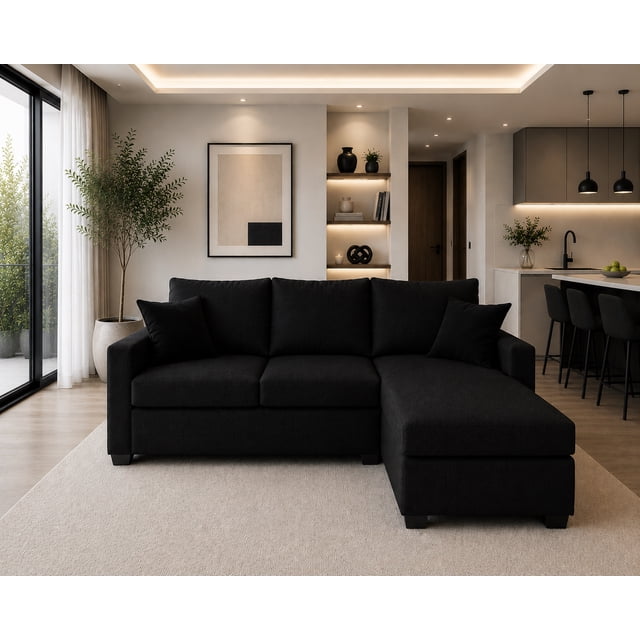 sala esquinera el bazar store denver lino negro 200x140 cm sofá derecho e izquierdo Vista frontal 3/4 del seccional Denver tapizado en lino negro con chaise a la derecha, silueta moderna y líneas rectas; asientos separados con acolchonamiento de hule espuma de alta densidad, 3 cojines grandes de respaldo y 2 cojines decorativos; patas cortas en madera oscura; medidas 200 x 140 x 75 cm. También suele usarse como área lounge para lectura o descanso en salas contemporáneas.
