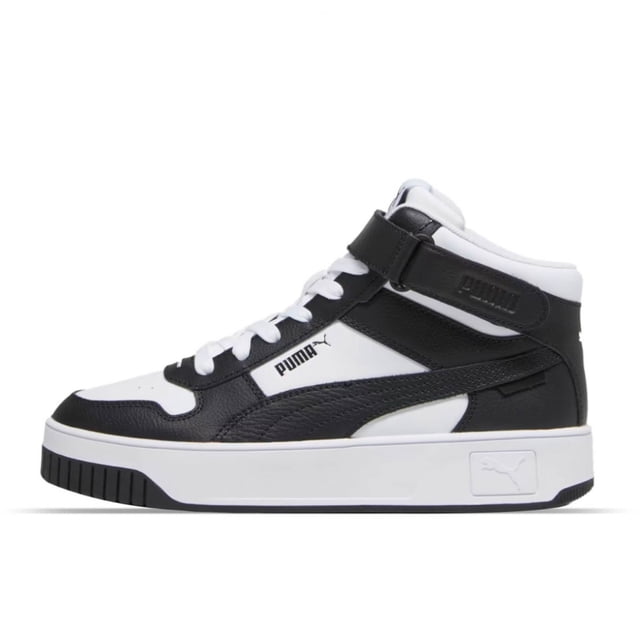tenis puma carina street mid mujer original 392337 03 zapatilla tipo botín con corte sintético en paneles blanco y negro, sistema de amarre con cordones y correa de velcro en el tobillo, lengüeta acolchada y suela de goma extragruesa blanca con logo PUMA en el lateral; vista lateral derecha sobre fondo blanco; también suele usarse como calzado urbano para recorridos diarios.