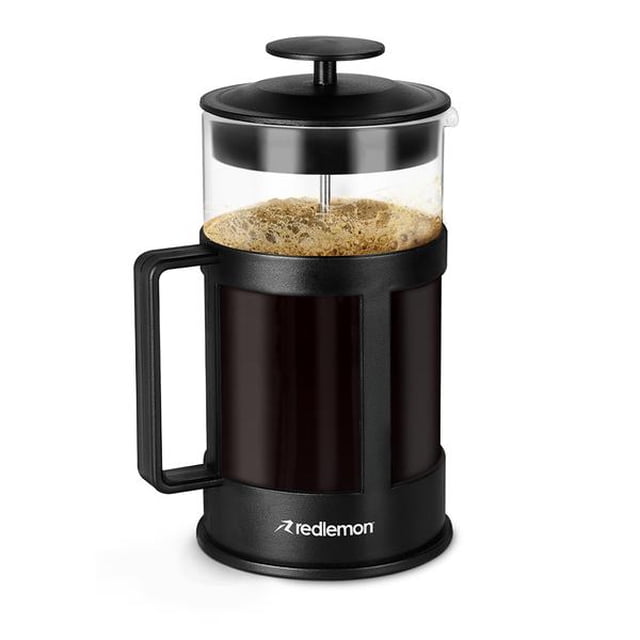 prensa francesa de vidrio redlemon para café y té 1l Prensa francesa de 1 L con vista frontal centrada: cuerpo de vidrio en marco y base negras, tapa y émbolo con varilla de acero inoxidable, mango de plástico ABS; café molido y espuma visibles en la cámara, sello hermético en la tapa; suele usarse también para preparar té o infusiones y compartir hasta 8 tazas.