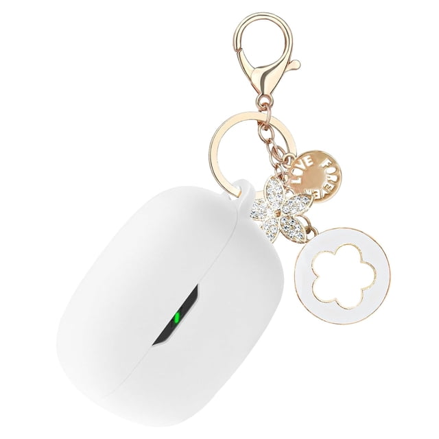 funda de silicona para jbl vibe beam/jbl vibe 200tws, color blanco — funda protectora blanca de silicona suave en vista frontal 3/4; carcasa cerrada con ranura que deja ver un indicador LED verde, incluye mosquetón dorado y llavero de trébol con charms brillantes; adecuada para transporte diario y suele usarse para fijar auriculares a llaves o bolsas.