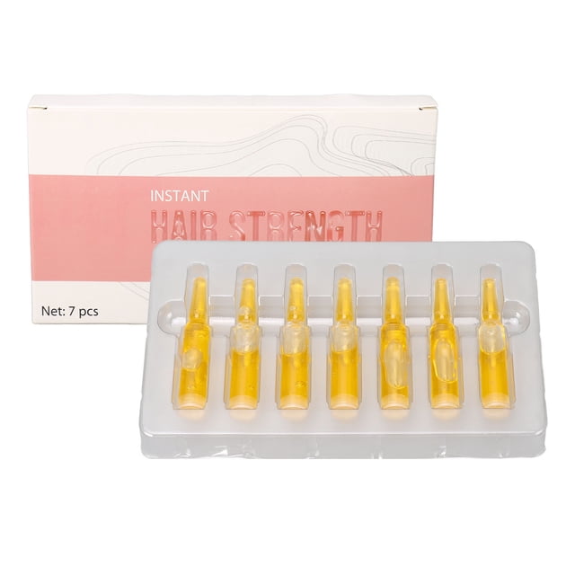 suero para el cabello, 2 ml, fortalecedor, 21 piezas — vista frontal de caja blanca y rosa y bandeja transparente que muestra siete ampollas amarillas de 2 ml (parte del juego de 21); líquido importado para tratamiento capilar antipérdida y fortalecimiento de raíces, sin irritación para hombres; a menudo usado para llevar en viajes.