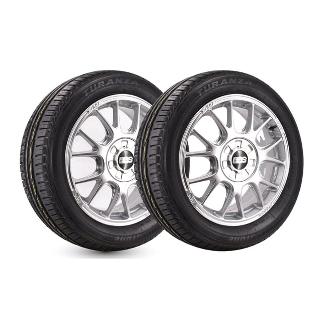 paquete de 2 llantas 205/55 r16 91v paquete bridgestone turanza er300, frontal 3/4 de dos llantas montadas en rines plateados con flanco marcado 'TURANZA', diseño de banda asimétrica visible y ranuras de agarre, textura de caucho negro; fondo blanco de estudio. A menudo usado por conductores que buscan equilibrio entre desempeño, comodidad y mayor estabilidad en carretera.