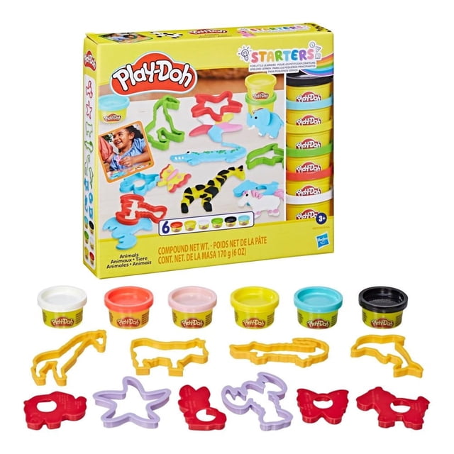 set de juego hasbro play doh fundamentals animales — caja frontal con 6 latas Play‑Doh (verde, rojo, azul, negro, blanco y amarillo) y moldes y cortadores de plástico amarillo, rojo y lila para formar animales marinos, salvajes y domésticos; vista centrada con piezas colocadas delante sobre fondo blanco; apoya el juego imaginario y la motricidad fina en preescolares; a menudo se usa para actividades de manualidades en casa.