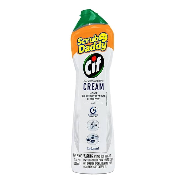 limpiador cif en crema scrub daddy 500 ml botella frontal curvada con tapa dispensadora verde; envase blanco y naranja con logotipos Scrub Daddy y CIF, etiqueta que indica crema limpiadora multiusos y pictogramas de uso en cocina y baño, texto inferior con instrucciones y símbolos. Apto para limpieza doméstica y suitable para eliminar restos de jabón y manchas de comida.