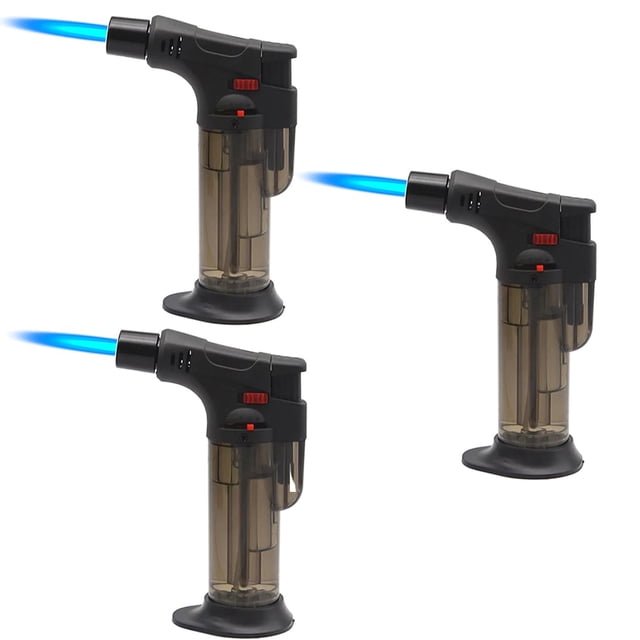 soplete de gas butano para cocina torchpro 3 pzas negro recargable plástico gas butano — tres encendedores compactos TourchPro negros con base ancha y cuerpo translúcido de plástico; boquilla angular con llama azul visible, dial regulador rojo y cierre de seguridad; vacíos (sin gas); adecuados para caramelizar y brulear postres.