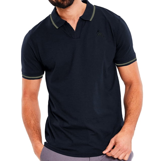 playera polo para hombre shendy vendy camisa manga corta casual negra, vista frontal del torso masculino con cuello tipo polo con solapas y abertura de botones, mangas cortas con ribete contrastante y logo tonal en el pecho; tela lisa, ideal para uso casual o de oficina.