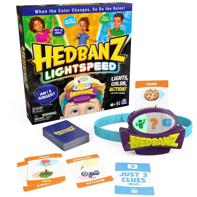 game spin master hedbanz lightspeed con luces y sonidos juego de mesa familiar — caja vertical a la izquierda y diadema electrónica morada y azul con logo 'Hedbanz' en primer plano; 74 cartas apiladas y cartas ejemplo (Cookie, Flower) y tarjeta 'Just 3 Clues' visibles sobre fondo blanco; colores en la caja indican modos verde, naranja y azul con luces y sonidos; también suele usarse como juego rápido para animar reuniones familiares.