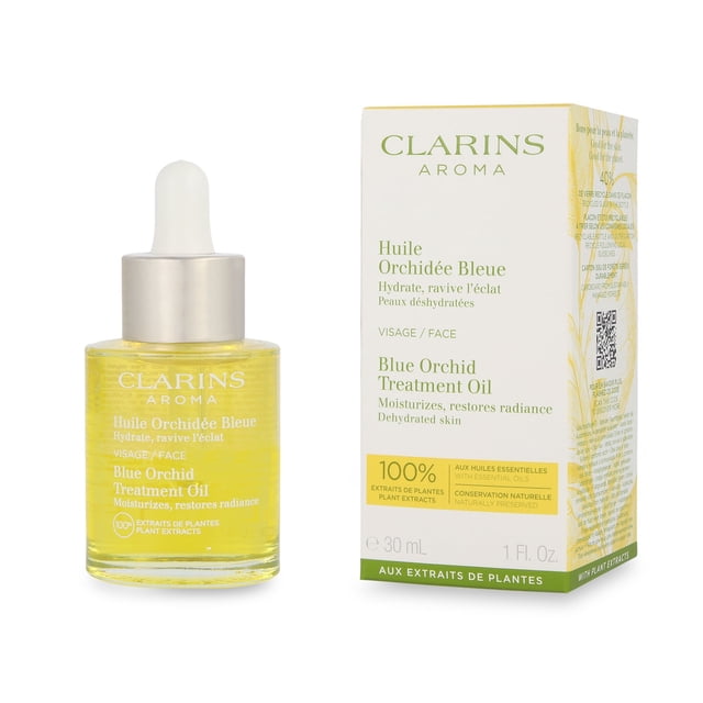 aceite facial blue orchid face treatment oil - Clarins frasco de 30 ml con cuentagotas y caja frontal blanca y verde; aceite amarillo transparente y etiqueta bilingüe. Tratamiento hidratante que ayuda a restaurar la luminosidad y la vitalidad de la piel deshidratada; también se usa a menudo como aceite ligero para masaje facial.