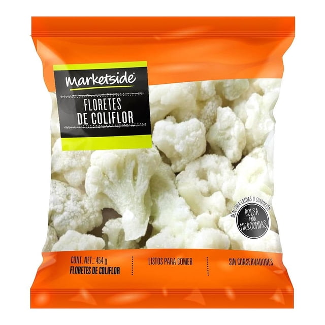 floretes de coliflor marketside 454 g Empaque frontal de plástico con floretes de coliflor congelados visibles; banda naranja superior e inferior, etiqueta Marketside negra y verde que indica "Floretes de Coliflor", sello "Bolsa para microondas" y peso 454 g; vegetal congelado que suele usarse también como guarnición.