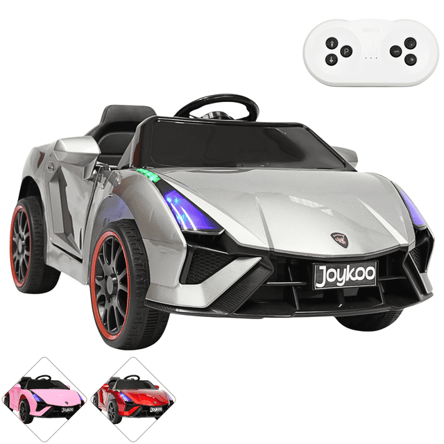 montable electrico para niños carro deportivo bluetooth luz led control remoto 12v - gris Carro montable deportivo gris en vista frontal 3/4 con puertas tipo alas de gaviota abiertas, faros LED encendidos, rines con borde rojo y volante con panel multimedia; asiento con cinturón visible y control remoto para control parental. Batería 12V incluida, apto 3-5 años y hasta 30 kg; a menudo usado también en modo mecedora para calmar al niño.