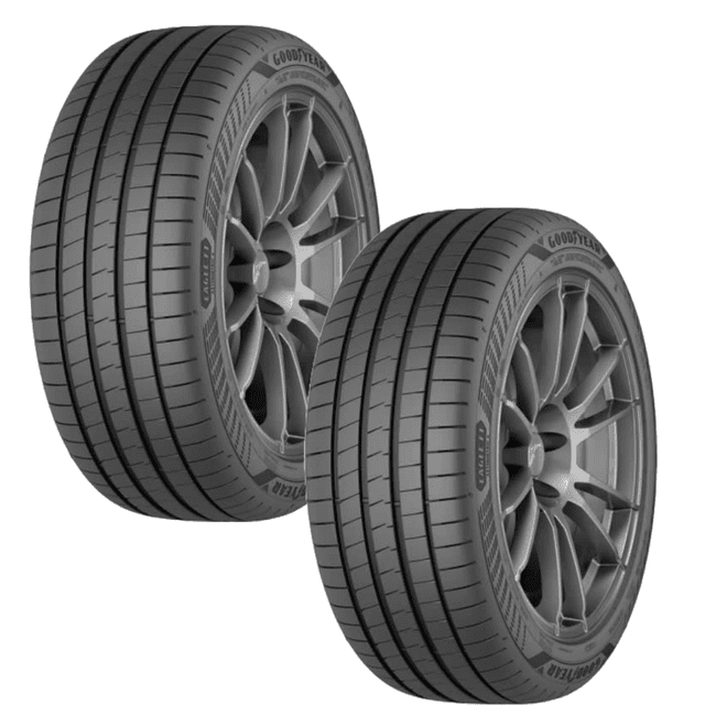 paquete de 2 llantas 215/45 r18 goodyear eagle f1 asymmetric 6 93v, vista 3/4 de dos llantas negras montadas en rines, banda de rodamiento con canales longitudinales anchos y nervios continuos, flanco con marca Goodyear y referencia 215/45 R18; diseñadas para manejo preciso y buen agarre en seco y mojado, a menudo usadas en vehículos deportivos o de alto desempeño.