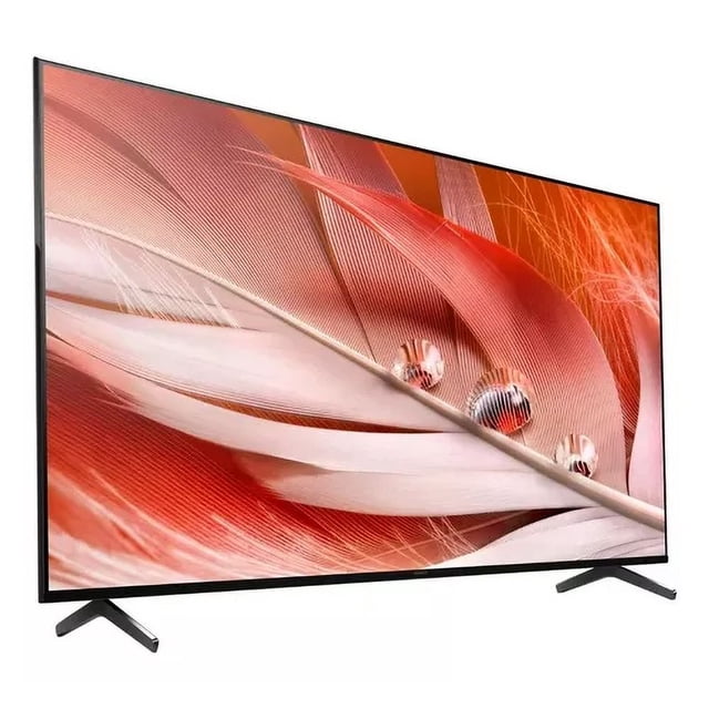 television sony 75" xr triluminos pro( 4k , audio en 3d ) Reacondicionado vista 3/4 frontal de televisor negro de 75 pulgadas con biseles delgados y patas en V, pantalla con gráficos abstractos rojos; indica XR Triluminos Pro, Contrast Booster, suavizado XR, Dolby Vision y Dolby Atmos, búsqueda por voz y audio en 3D.