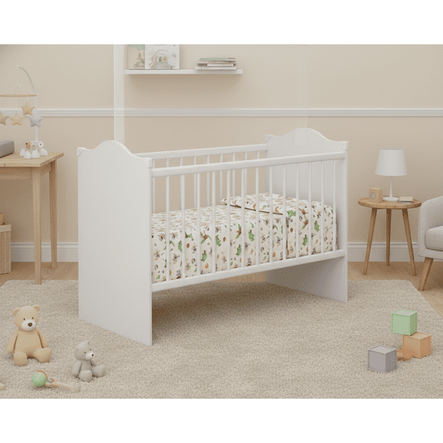 cuna blanco premium 2718.156 madik cuna infantil blanca 3/4 frontal con barandas palito verticales, esquinas con protectores y soporte para tela mosquitera; base de colchón ajustable en 3 niveles, compatible con colchón 1.30 x 0.70 m (no incluido), fabricada en paneles MDP/MDF con acabado en melamina, lista para armar; también suele usarse para guardar ropa de bebé doblada cuando se retira temporalmente el colchón.