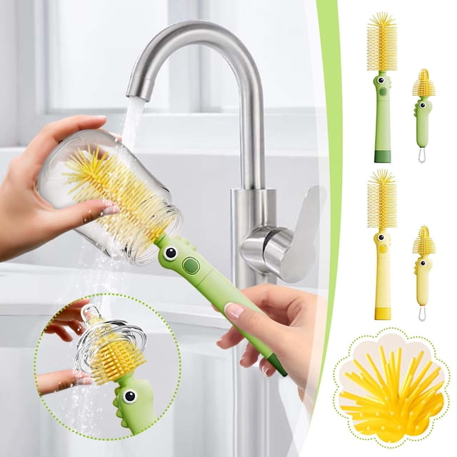 juego de cepillo de silicona para biberones y cepillos para pezones - kit portátil de limpieza de 2 piezas para biberones, copas y accesorios, cepillo largo verde con cabezal de cerdas amarillas de silicona enjuagado bajo grifo; recortes laterales muestran el cepillo corto para tetinas y un primer plano de las puntas flexibles. Diseño compacto RINYA, también apto para limpiar vasos y accesorios pequeños en viaje.