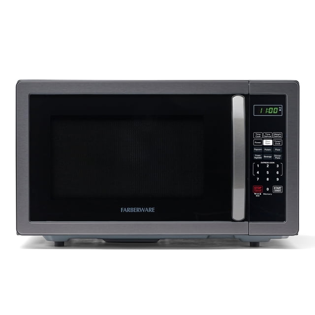 farberware countertop microwave 1000 watts, 1.1 cu ft - microwave oven with led lighting and child lock - perfect for apartments and dorms - easy clean black stainless steel vista frontal de microondas Farberware 1.1 cu ft en acero inoxidable negro con ventana grande, mango integrado a la derecha, panel digital con reloj LED verde y botones de cocción de un toque; luz interior LED visible y pies bajos; ideal para apartamentos, oficinas y dormitorios y apto para recalentar comidas listas rápidamente.