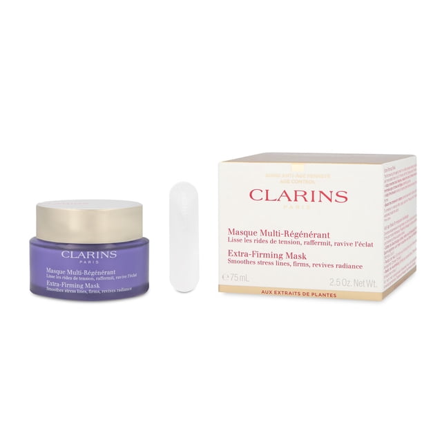 mascarilla reafirmante extra-firming mask clarins tarro de 75 ml y caja blanca con texto, vista frontal a nivel; frasco morado con tapa dorada y espátula blanca junto a caja que muestra marca Clarins y leyendas en francés e inglés, presentación de producto para cuidado facial.