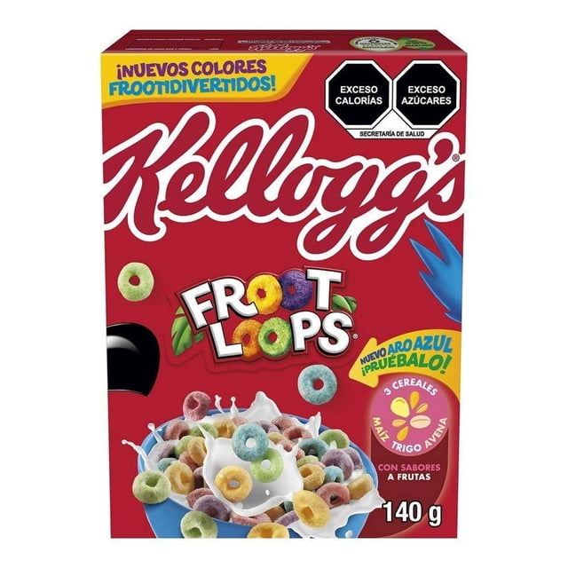 cereal kellogg's froot loops original 140 g Caja frontal sobre fondo rojo con logotipo Kellogg's grande; tazón azul con anillos multicolor de maíz, trigo y avena bañados en leche y salpicaduras; sellos negros "Exceso Calorías" y "Exceso Azúcares" en la esquina superior derecha; rótulo amarillo que anuncia nuevo aro azul; ideal para desayuno o merienda en la despensa del hogar.