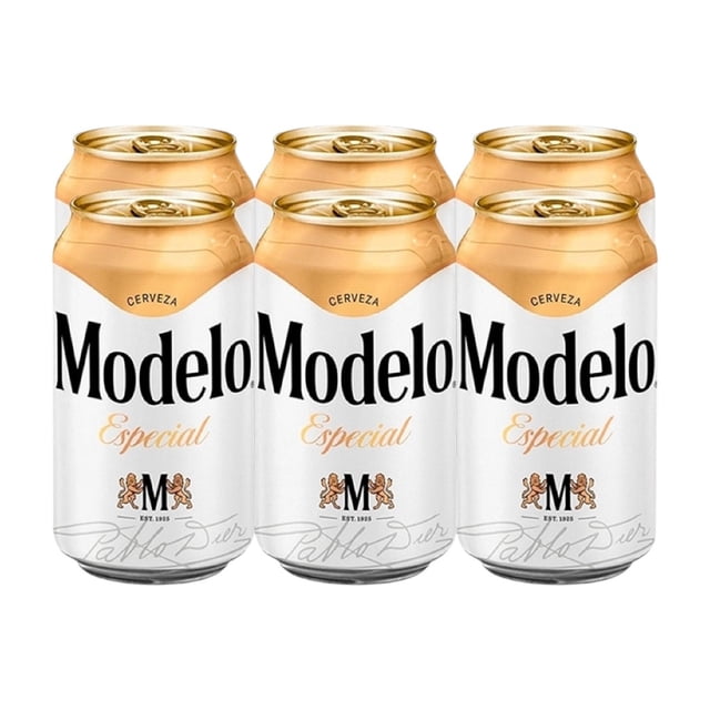 cerveza clara modelo especial 6 latas de 355 ml c/u Pack de 6 latas Modelo Especial 355 ml, vista frontal centrada de las latas en dos filas; envase blanco con logo 'Modelo' en negro, texto 'Especial' en dorado y tapa dorada; silueta cilíndrica y diseño de lata visibles. Adecuada para acompañar mariscos y pastas, y comúnmente usada en reuniones informales.