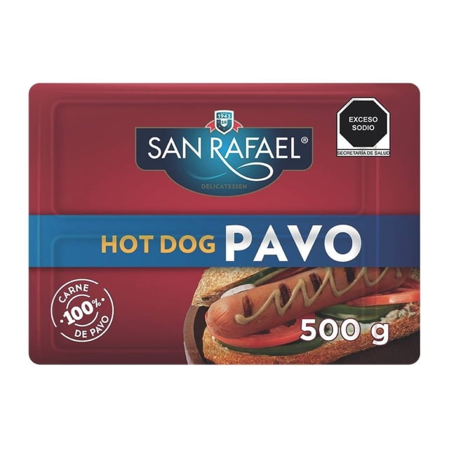 salchicha de pavo san rafael para hot dog 500 g paquete frontal con logo SAN RAFAEL, texto "HOT DOG PAVO" y peso 500 g; foto de hot dog con mostaza y vegetales, sello "carne 100% de pavo", empaque resellable visible y etiqueta de advertencia "exceso sodio". Ideal para asar o preparar hot dogs en casa; también suele usarse para snacks rápidos.