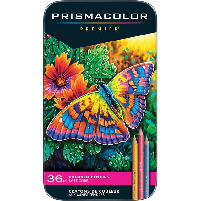 lápices de color prismacolor premier set de 36 colores variados unisex caja metálica frontal con ilustración colorida de mariposa y flores, logotipo PRISMACOLOR en la parte superior y rótulo "36 ct" en la base; presentación dirigida a papelería profesional, indicada para sombreado y trazos intensos con núcleos suaves.