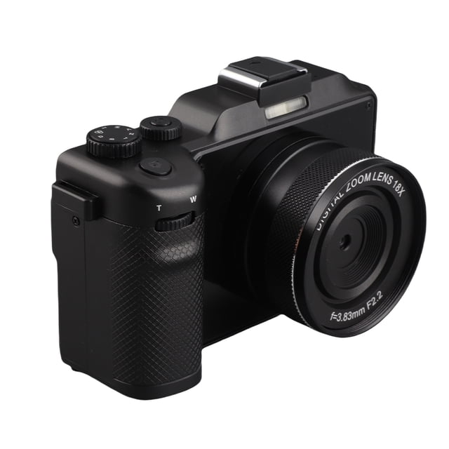cámara digital micro slr Tebru 56MP 4K 60fps, cuerpo negro con agarre texturizado y lente frontal marcada "DIGITAL ZOOM LENS 18X"; 3/4 frontal que muestra dial de modos, botón de disparo, zapata para flash y anillo de zoom; pantalla giratoria de 3 pulgadas (270°) compatible con selfies; a menudo usada como cámara compacta de viaje por su tamaño y zoom digital 18x.