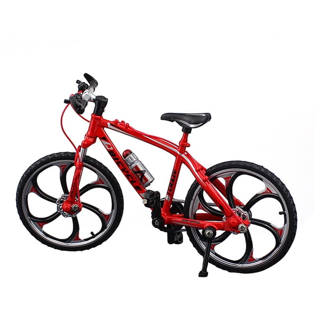 xihbxyly solo productos fabricados en estados unidos bicicleta de carreras de aleación, juguete para decoración del hogar rojo, vista 3/4 frontal de bicicleta de carreras de aleación roja con cuadro tubular curvado, ruedas de cinco radios negras con detalles rojos, sillín y manubrio negros con cables visibles y caballete sobre fondo blanco; vehículo de juguete adecuado para decoración o exhibición.