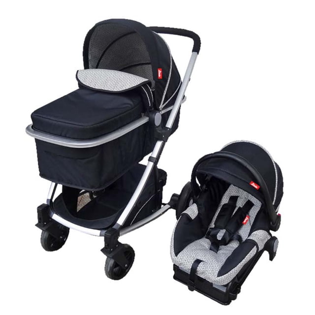 carriola travel system d´bebé negro 45 travel system Crown: carriola negra con chasis de aluminio, capota y cubrepiés en tejido gris jaspeado, cesta inferior y ruedas delanteras giratorias; incluye autoasiento 1ra etapa con arnés de 5 puntos y base; también es adecuada para salidas urbanas cortas o transporte en auto.