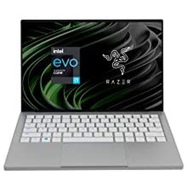 laptop razer book 13 i7 uhd+ 16gb 512gb chroma -gris vista frontal de portátil Razer gris con pantalla abierta; silueta delgada tipo clamshell, teclado retroiluminado blanco, gran trackpad, pantalla UHD+ con logo Razer e insignia Intel Evo, acabado metálico mate y bordes delgados, a menudo usada como portátil de trabajo móvil.
