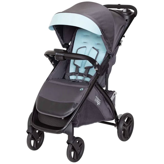 baby trend tango™ stroller, blue mist cochecito en vista frontal 3/4 mostrando marco doble y ruedas delanteras giratorias; asiento acolchado azul claro con arnés de 5 puntos, dosel extralargo con visera UPF 50+, consola para padres con posicionador de celular vertical/horizontal y dos portavasos extra profundos, gran canasta con acceso frontal y posterior y plegado rápido con una mano que se mantiene plegado; a menudo usado para paseos urbanos y viajes cortos.
