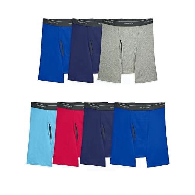 calzoncillos tipo bóxer Fruit of the Loom Coolzone para hombre, paquete de 7 multicolor con bragueta de malla y pretina negra; vista frontal de siete bóxers en dos filas en tonos azul, gris, rojo y celeste sobre fondo blanco. Su diseño incluye malla ventilada en la bragueta para mayor transpirabilidad, y su corte largo evita que se suban las piernas; también suelen usarse como bóxers deportivos ligeros para viajes cortos.
