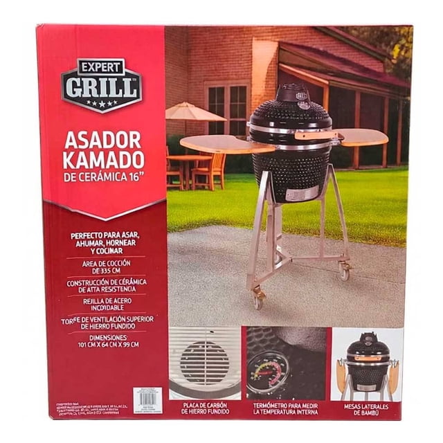 asador kamado Expert Grill 101 x 64 x 99 cm construcción de cerámica negro, vista frontal centrada con mesas laterales desplegadas, cuerpo cerámico texturizado negro, base metálica con ruedas, rejilla de acero inoxidable visible, termómetro en la tapa y torre de ventilación superior de hierro fundido; apto para asar y ahumar alimentos.