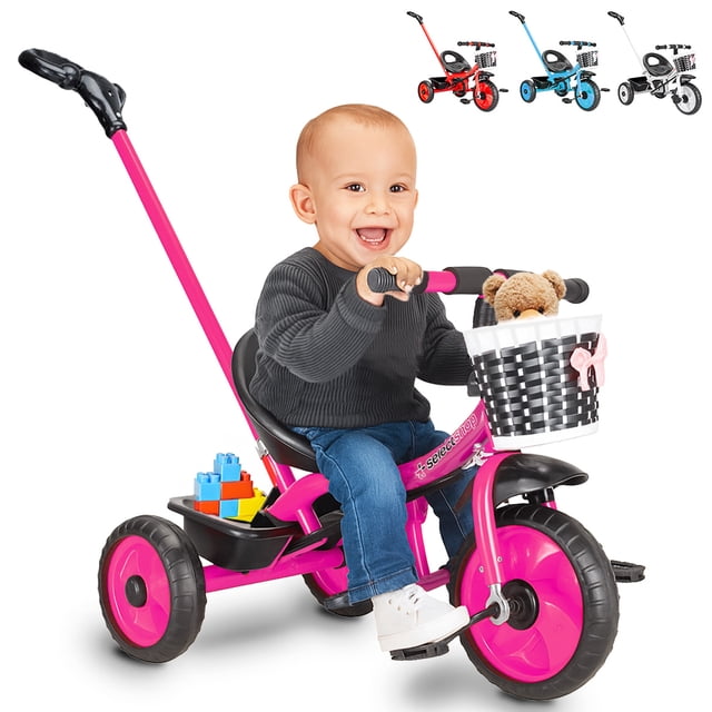 triciclo bicicleta juguete para niños infantil cesta cajuela Rosa SELECTSHOP, vista 3/4 frontal con niño sentado; marco bajo y pedales delanteros, asiento y empuñaduras negras, cesta blanca tipo mimbre con moño rosa, cajuela trasera plana para juguetes y barra guía trasera para empujar por un adulto. A menudo usado para desarrollar coordinación motriz en primeros paseos.