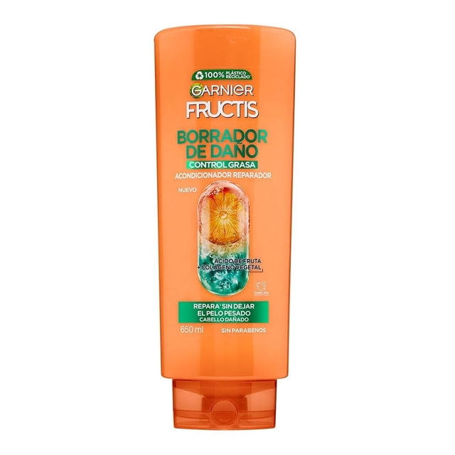 acondicionador garnier fructis borrador de daño control grasa 650 ml botella naranja frontal con tapa a presión, acondicionador reparador para raíces grasas y cabello dañado, etiqueta muestra ácido de fruta y colágeno vegetal y gráfico de fruta en el frente.