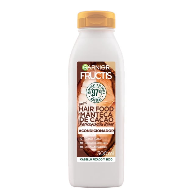 acondicionador fructis hair food manteca de cacao para cabello rizado 300 ml, botella blanca vista frontal con etiqueta marrón que muestra trozos de cacao, logotipo Fructis y sello 97% ingredientes naturales, tapa amarilla y leyenda para cabello rizado y seco; también suele usarse como acondicionador diario para definir rizos y reducir frizz.