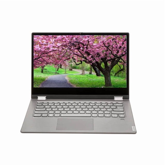 laptop lenovo thinkbook 14-iml, reacondicionado, core i7-10ª, 16gb ram, ssd de 1tb, 14" front-facing abierto con pantalla 14" Full HD (1920x1080) que muestra un parque con árboles en flor, chasis y teclado negros, trackpad centrado y bisagras visibles, perfil delgado 17.9 mm; adecuado para ofimática y suele usarse como equipo de viaje por su tamaño compacto.