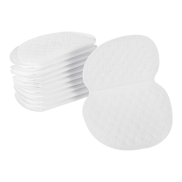 almohadilla adhesiva para el sudor en las axilas. paquete de 10 almohadillas blancas ergonómicas, vista frontal con una apilada; textura acolchada perforada y borde sellado visibles, adhesivo fuerte según especificaciones para fijar a la ropa, ligera y portátil, antitranspirante y adecuada para viajes y uso diario.