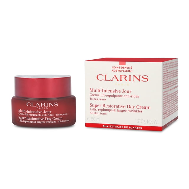 crema de día clarins super restorative day cream Frasco y caja multicolor de 50 ml, vista frontal centrada; tarro redondo rojo con tapa plateada y caja blanca con ribete rojo y texto Clarins, envase sobre fondo blanco. Producto indicado para reducir daños de la piel por cambios hormonales y proporcionar efecto lifting según especificaciones.