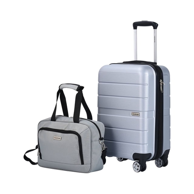 maleta de mano de 20 pulgadas rigida expandible con neceser impermeable carry on Compass Chicago color plateado, 3/4 frontal con trolley extendido; maleta rígida plateada de ABS con bandas horizontales, cremallera expandible negra, candado TSA integrado, 8 ruedas multidireccionales 360° y mango telescópico; neceser a juego en poliéster 600D con asas y correa desmontable, ideal para organizar accesorios de viaje.