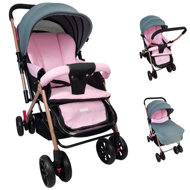 carriola reversible the baby shop asiento reclinable 3 posiciones, plegable y ligera de viaje rosa Carriola rosa The Baby Shop, vista frontal 3/4 con asiento acolchado en reclinado medio, manubrio reversible con empuñadura negra, toldo plegable gris con panel de malla, barra frontal acolchada y canastilla inferior amplia. Ruedas dobles EVA delanteras giratorias con seguro y freno trasero; reposapiés ajustable, ideal para salidas diarias.